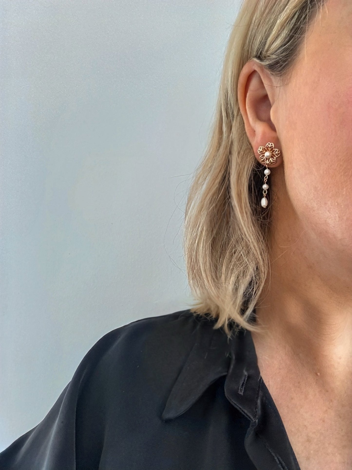 Model wearing freshwater pearl earrings