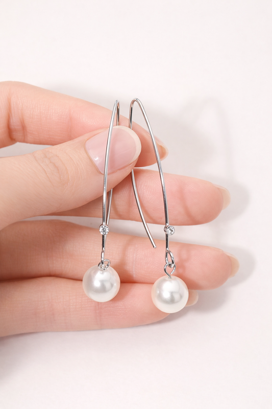 Silver and pearl fish hook earrings